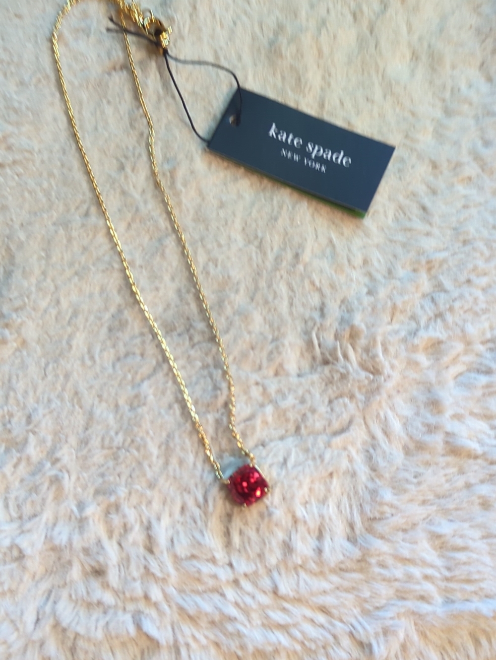 kate spade gold chain necklace with red pendant